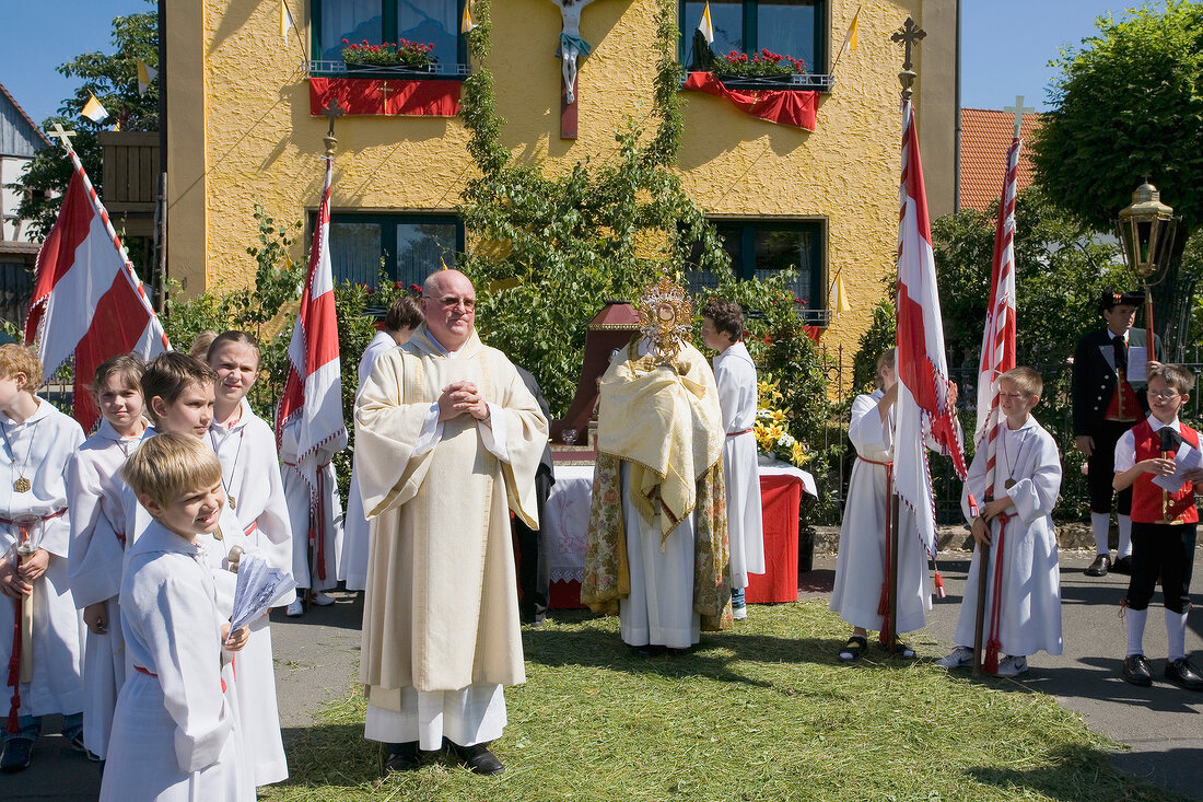 Procession on road in Franconian Switzerland, Bavaria, Germany