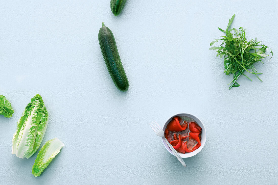 Vegetables for salad on white background