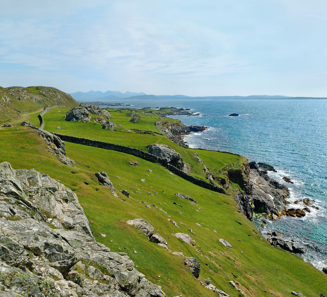 View of green rocky coast of Atlantic in Inishbofin, Ireland