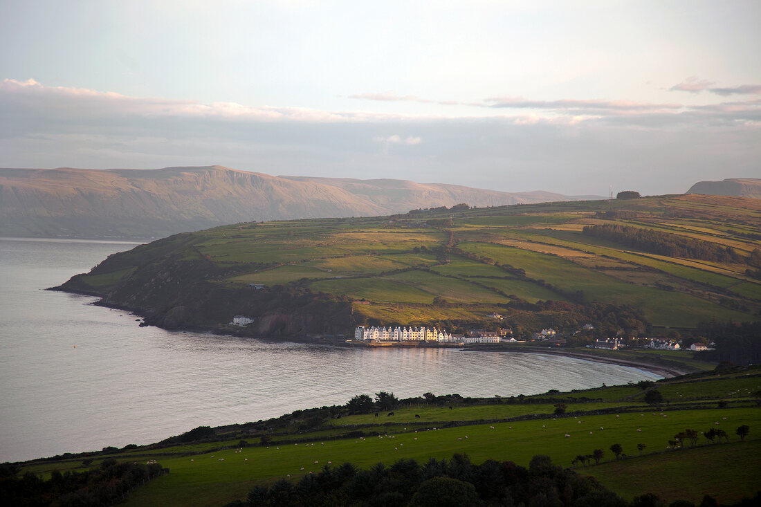 View of Antrim Coast Torr Head mountain with green coast, Ireland, UK