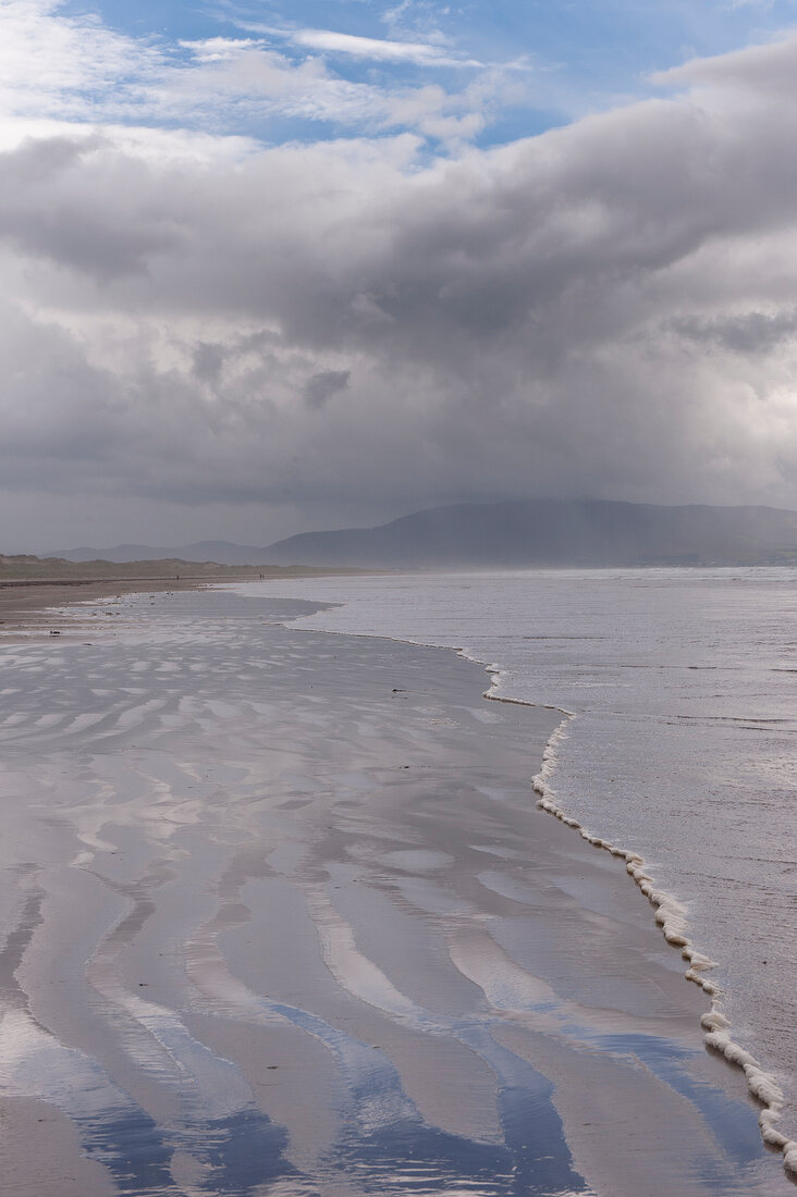 View of mountains, fog and clouds at Ring of Kerry Inch Beach, Ireland, UK