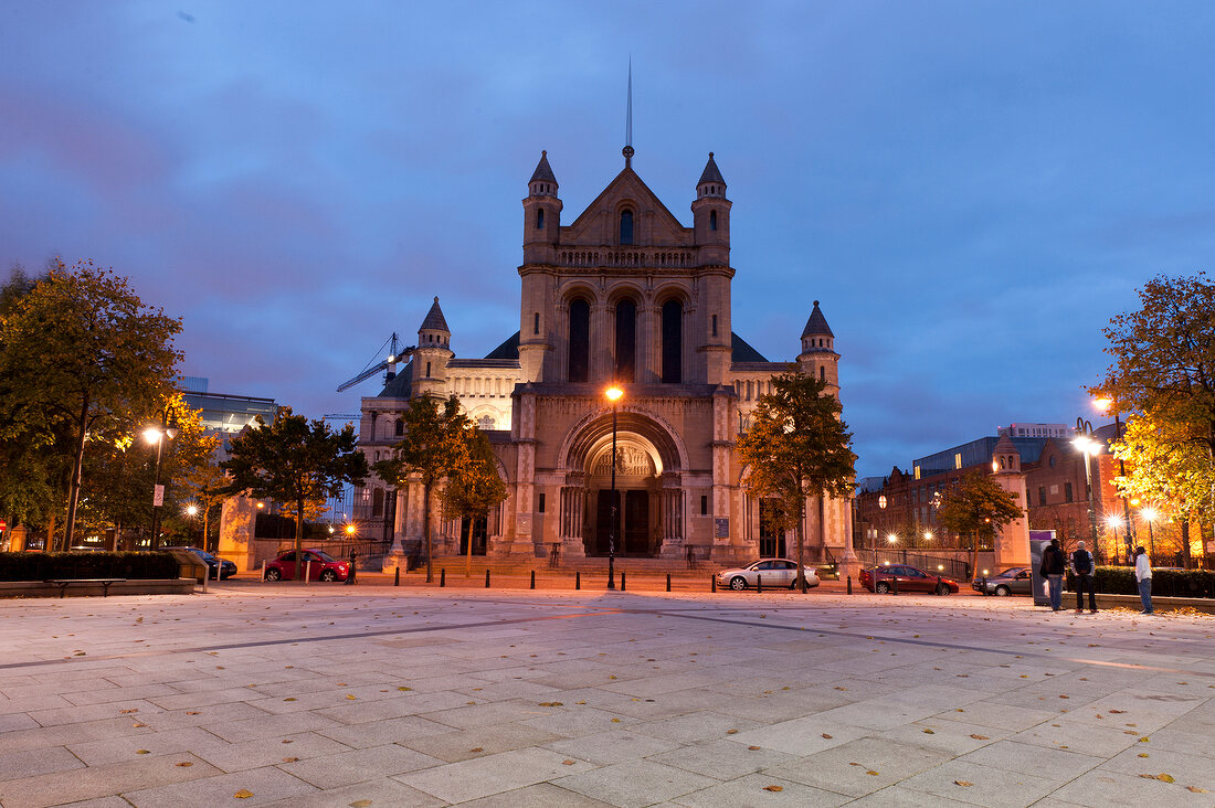 Facade of St. Annes Cathedral illuminated at night in Belfast, Ireland