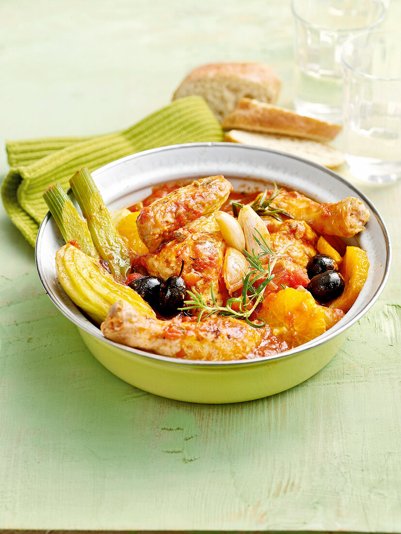 Chicken with fennel and olives in bowl
