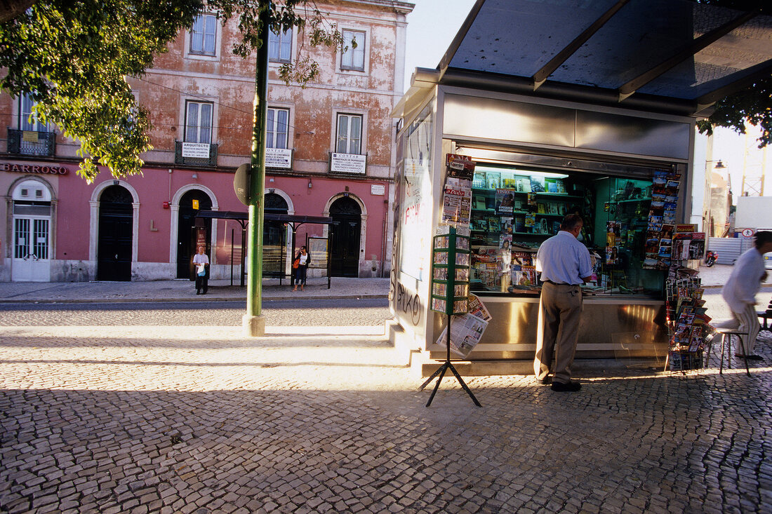 People at book stall in Praca do Imperia, Lisbon