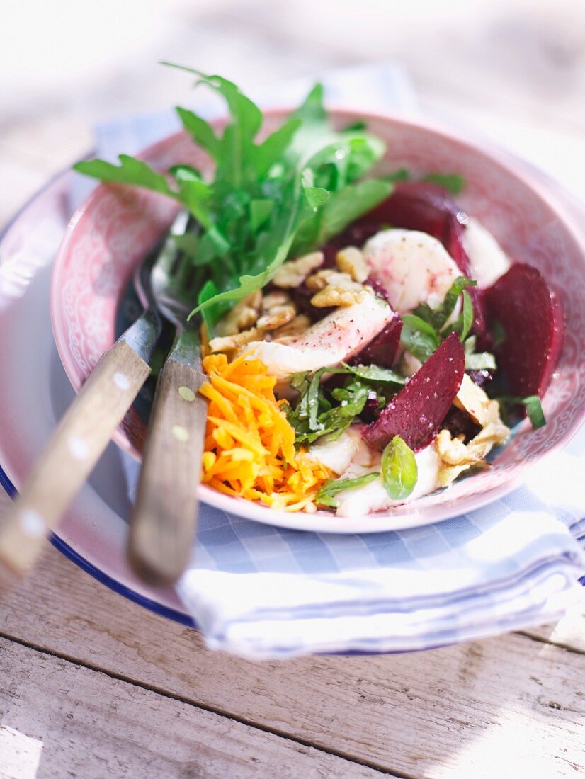 A beetroot salad with mozzarella and walnuts