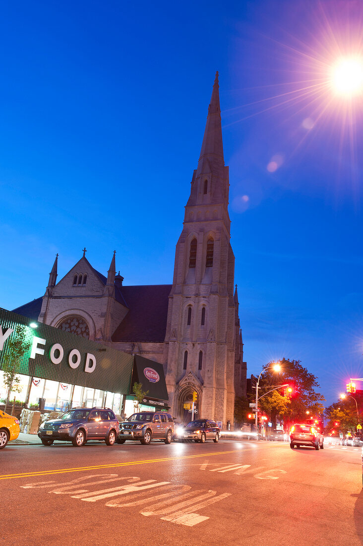 View of church and vehicles on road at Park Slope, New York, USA