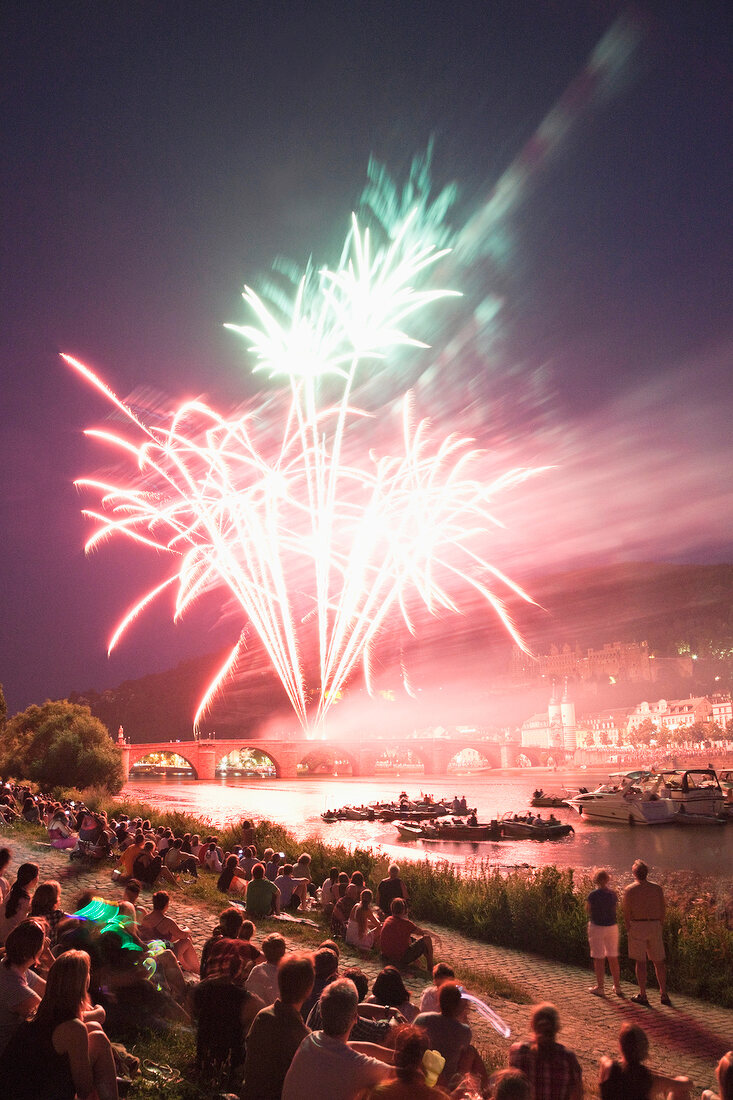 View of fireworks on Karl-Theodor Bridge Castle Neckar at evening in Heidelberg, Germany