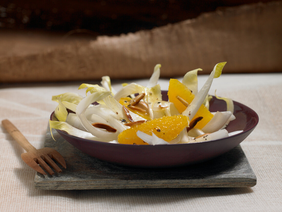 Chicory and orange salad in bowl