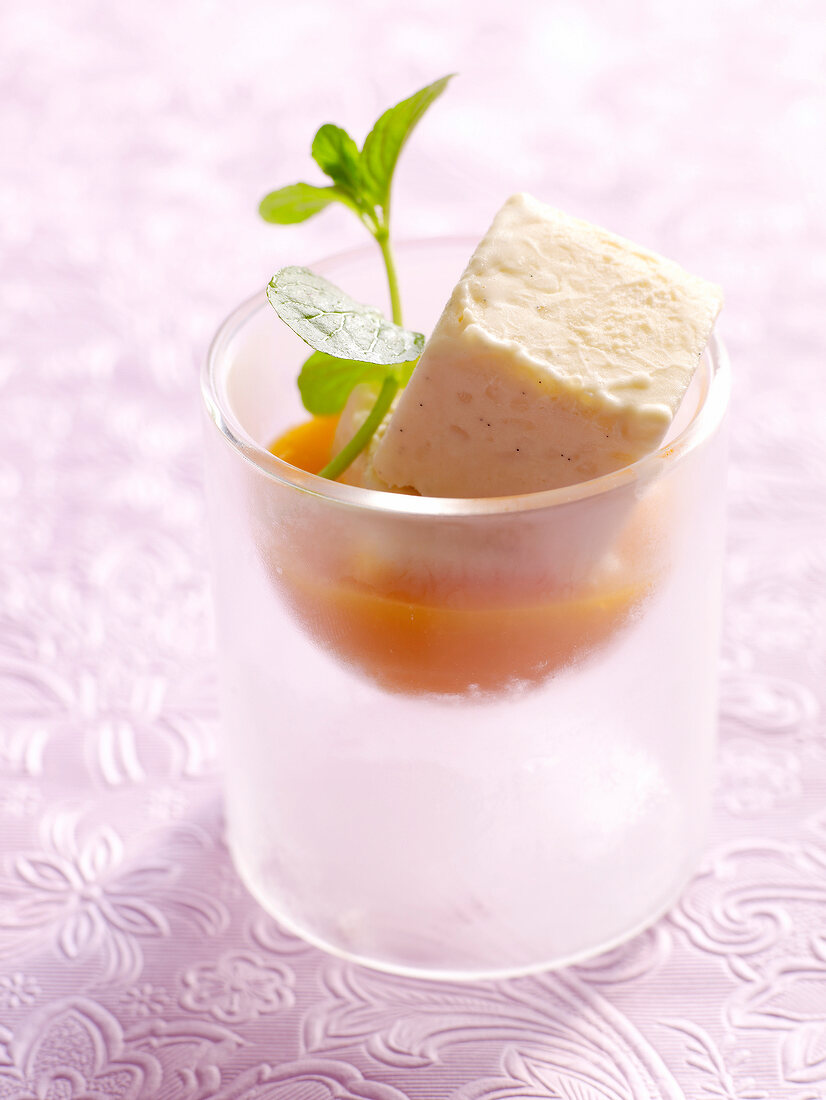 Close-up of rice pudding ice-cream with marachino, apricot and mango