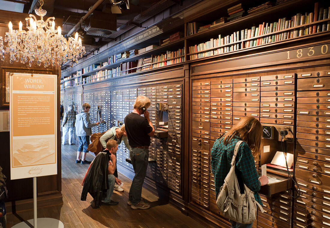 People at archives of German Emigration centre museum in Bremerhaven, Bremen, Germany