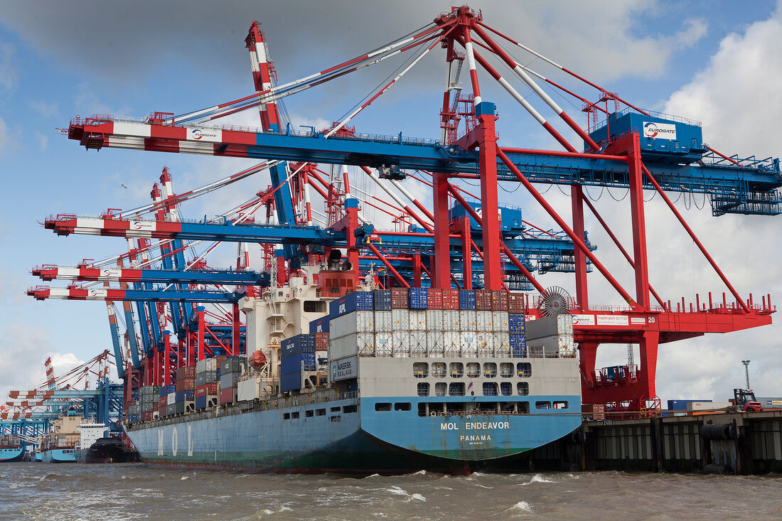 Containers being loaded on ship with cranes, Bremerhaven, Bremen, Germany