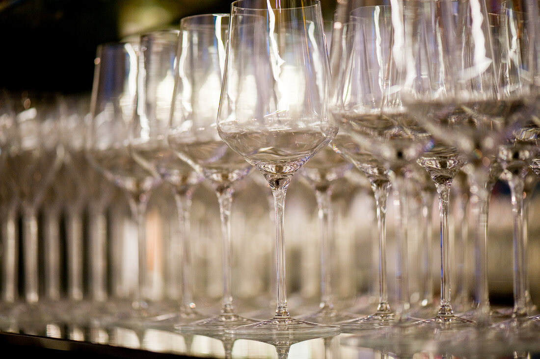 Close-up of wine glasses at a wine bar in Vienna, Austria