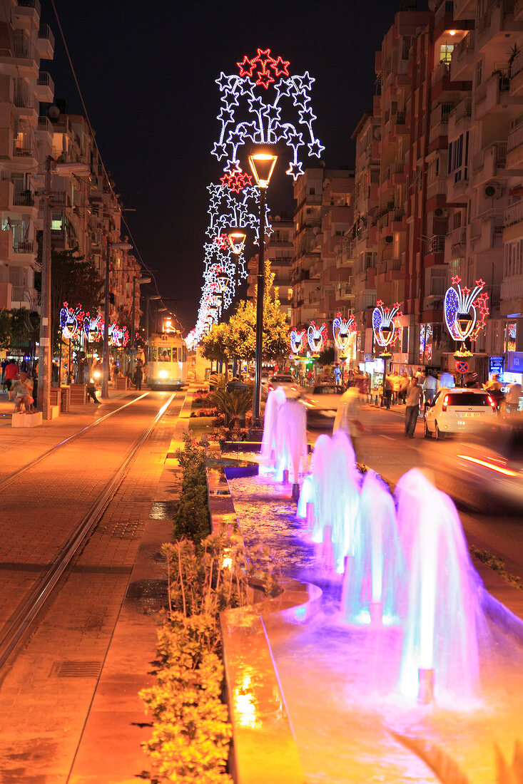 Fountains and street lights of Cetinkaya Caddesi street at night, Antalya, Turkey