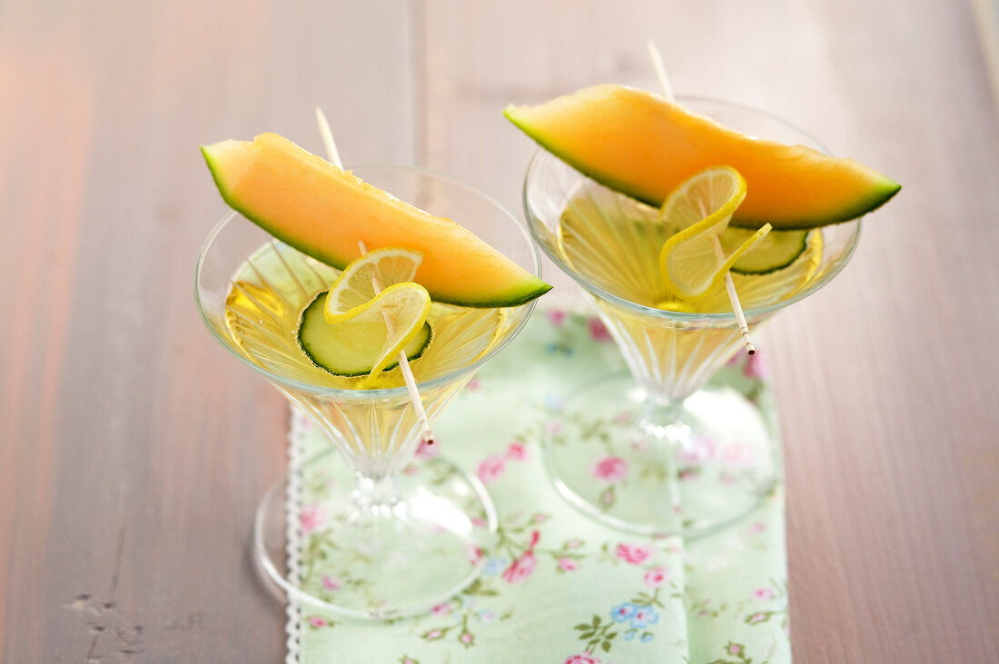 Melons and cucumber punch in glasses