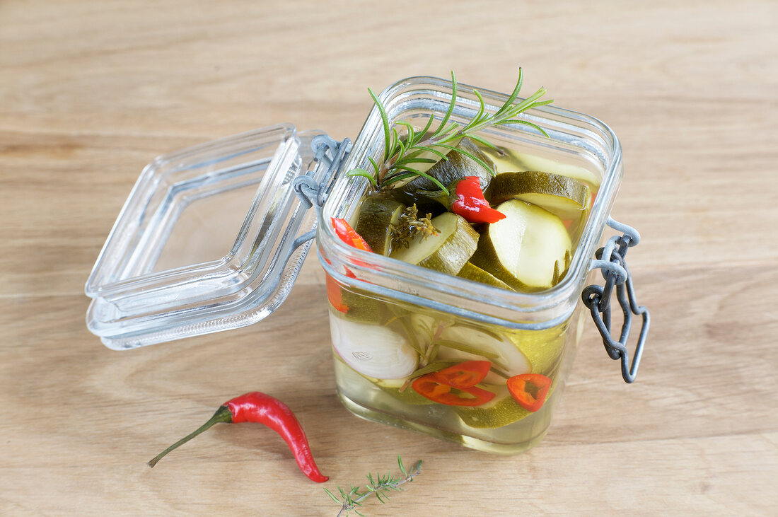 Pickled zucchini in preserving jar