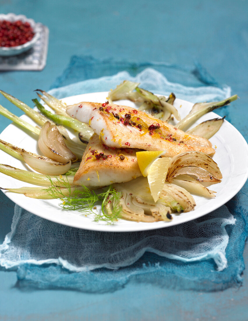 Close-up of pepper fish with fennel on plate