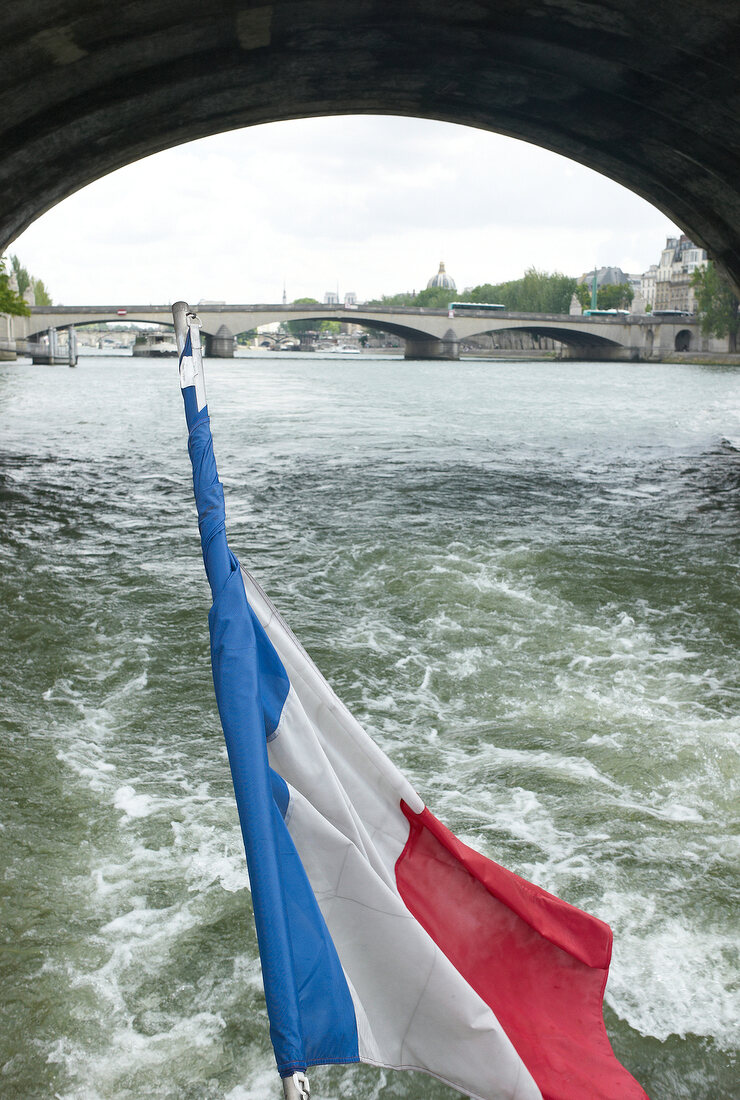 View of Seine River and bridge from boat