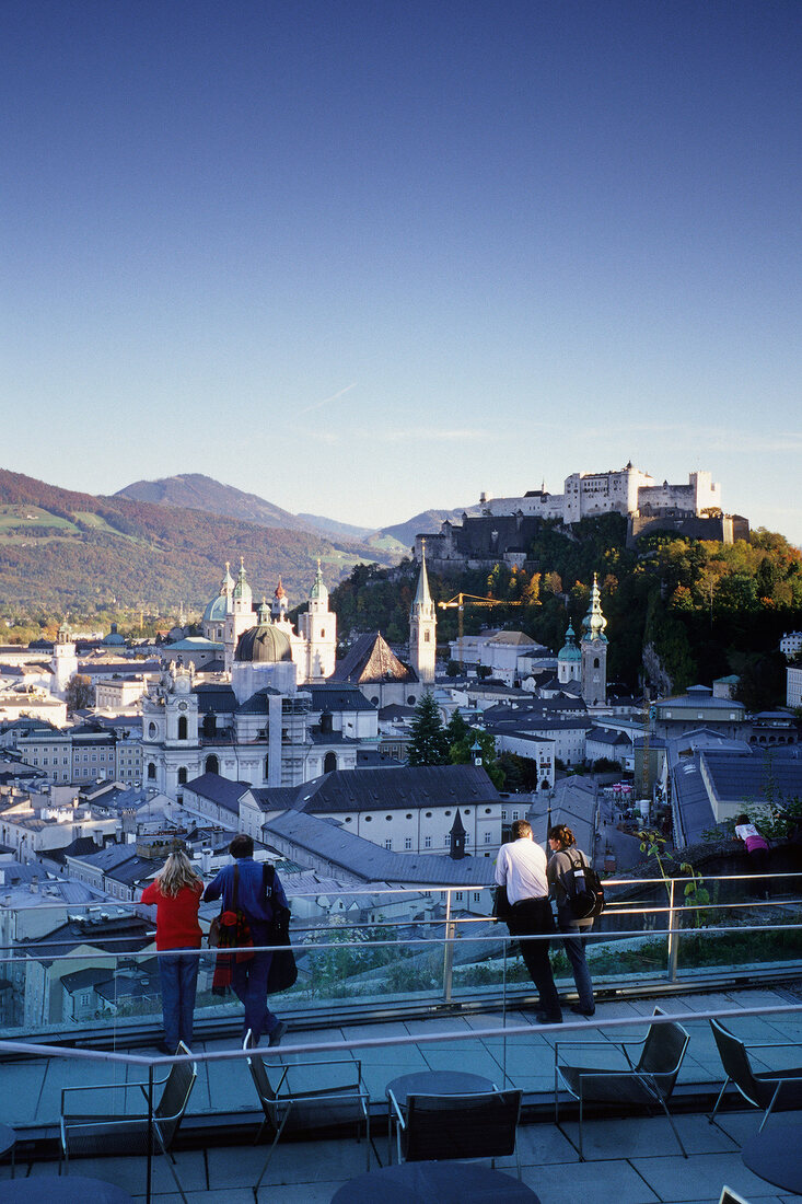 People looking at cityscape from the tower of Modern Museum, Salzburg, Austria