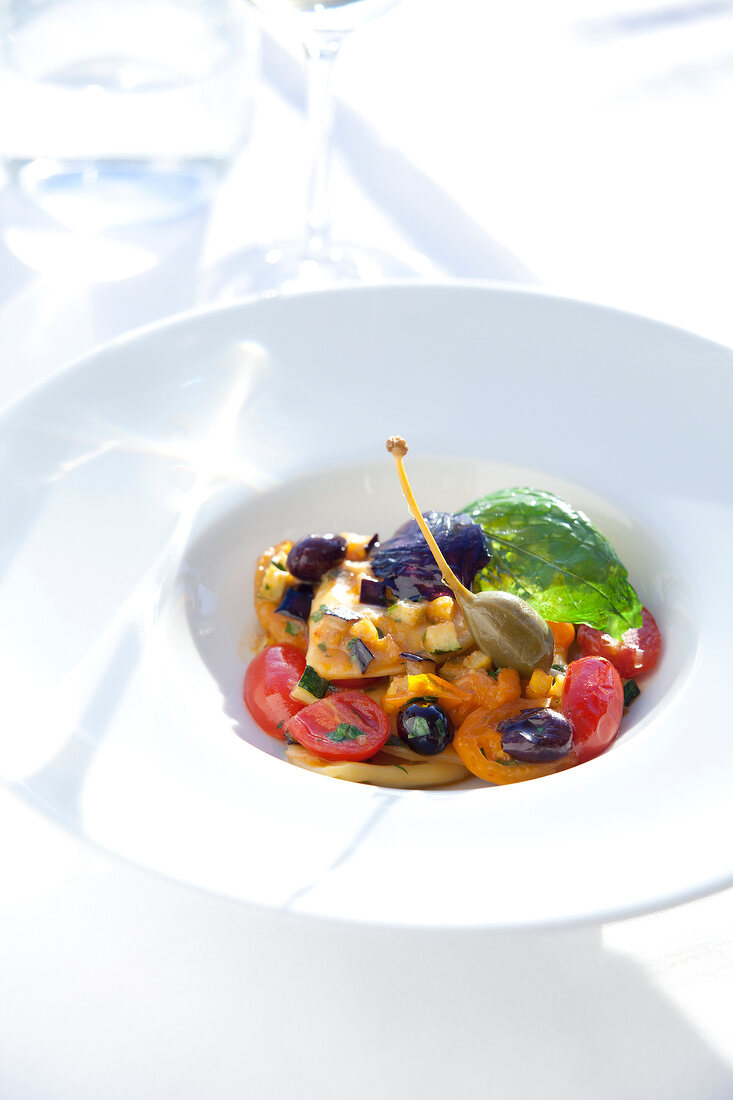 Fresh cheese ravioli with vegetables in serving dish in Hotel Eden Roc, Ascona