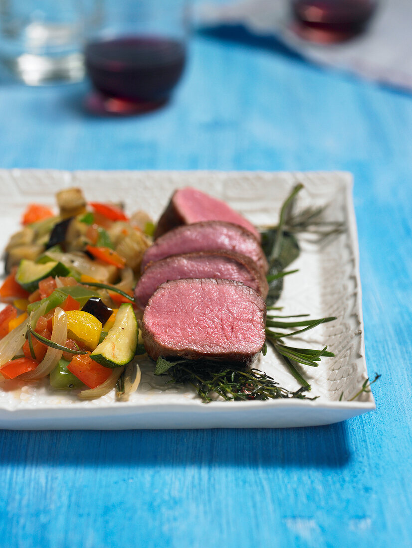 Fillet of lamb with ratatouille in serving dish