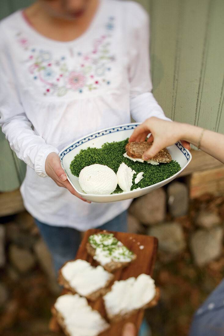 Chives and cheese bread in serving bowl