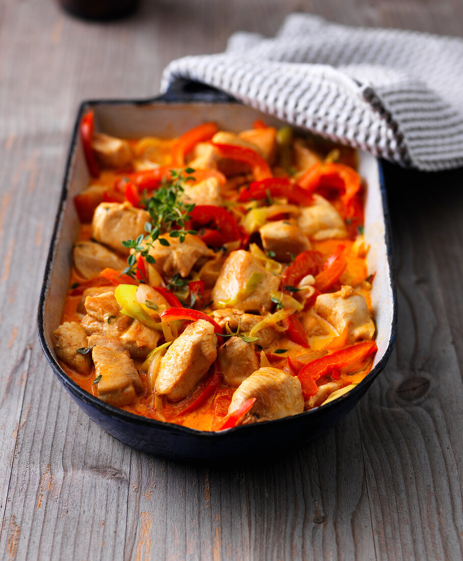Chicken goulash with paprika in baking tray