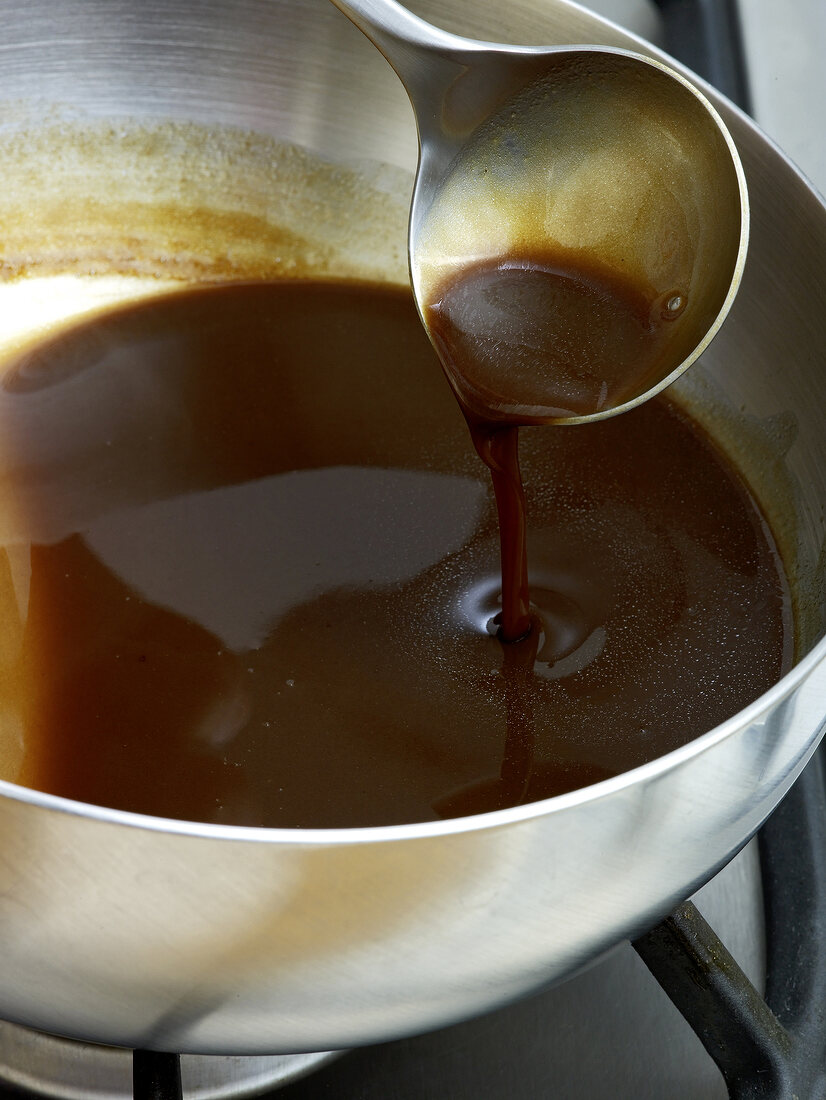 Close-up of sauce being stirred in bowl, step 3