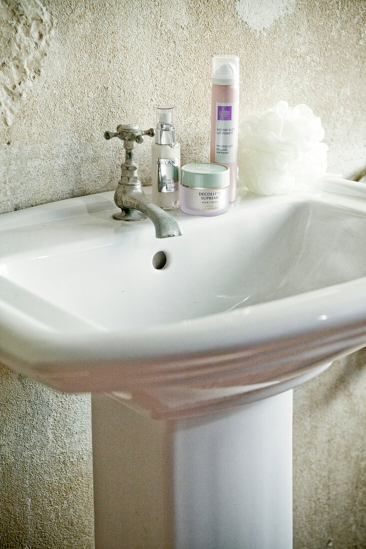 Cosmetics on bathroom sink