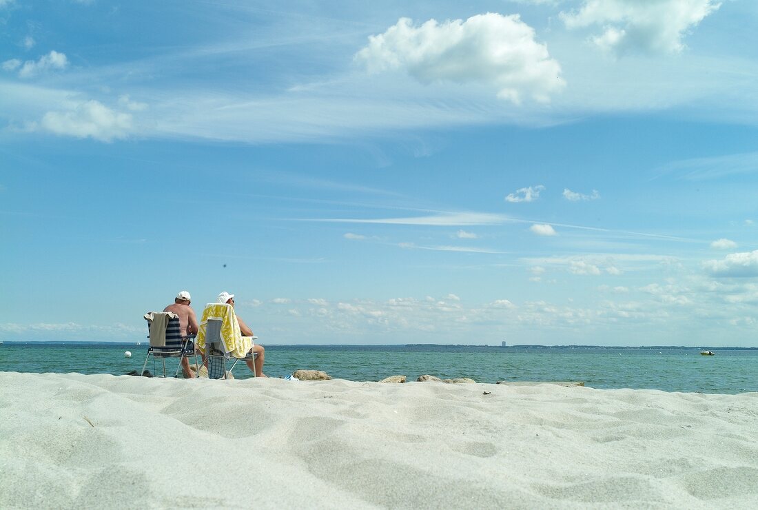 Tourist relaxing at Sierksdorf beach, Baltic Sea Coast, Germany