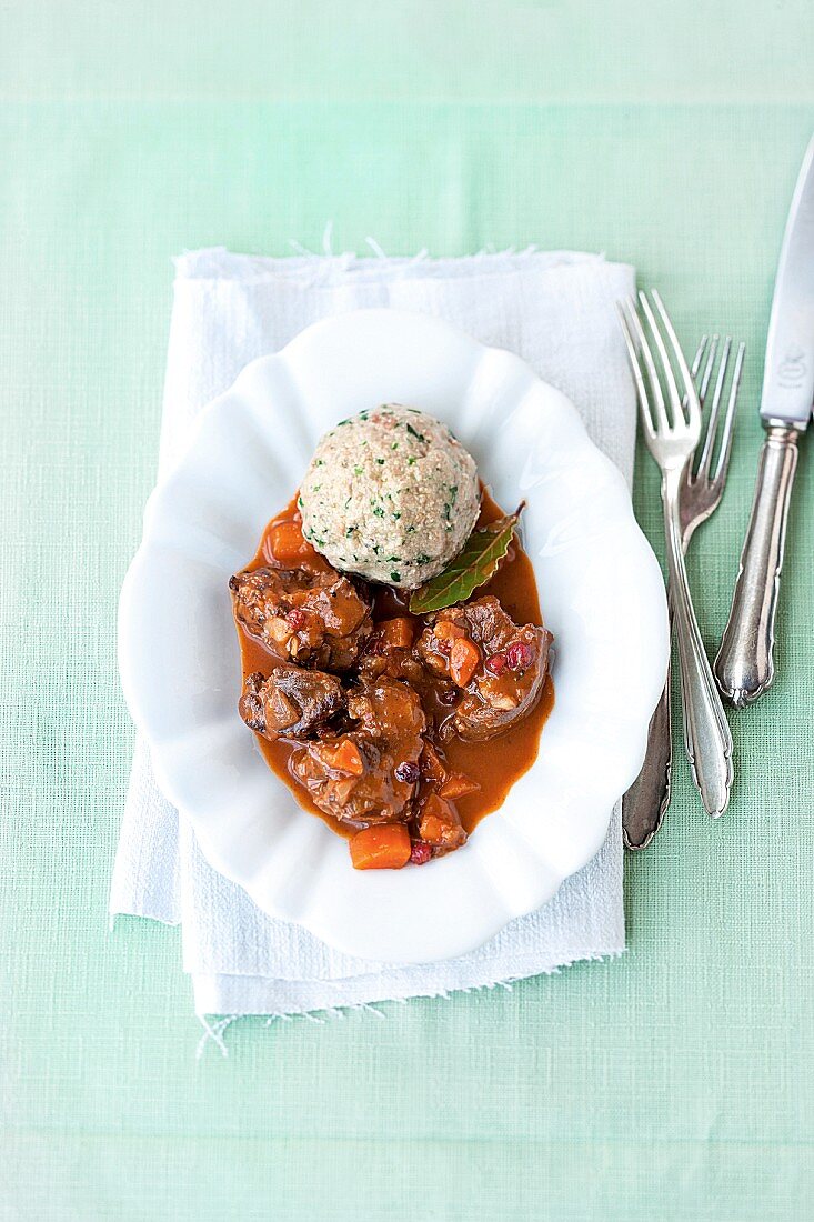 Venison goulash with carrots and a dumpling