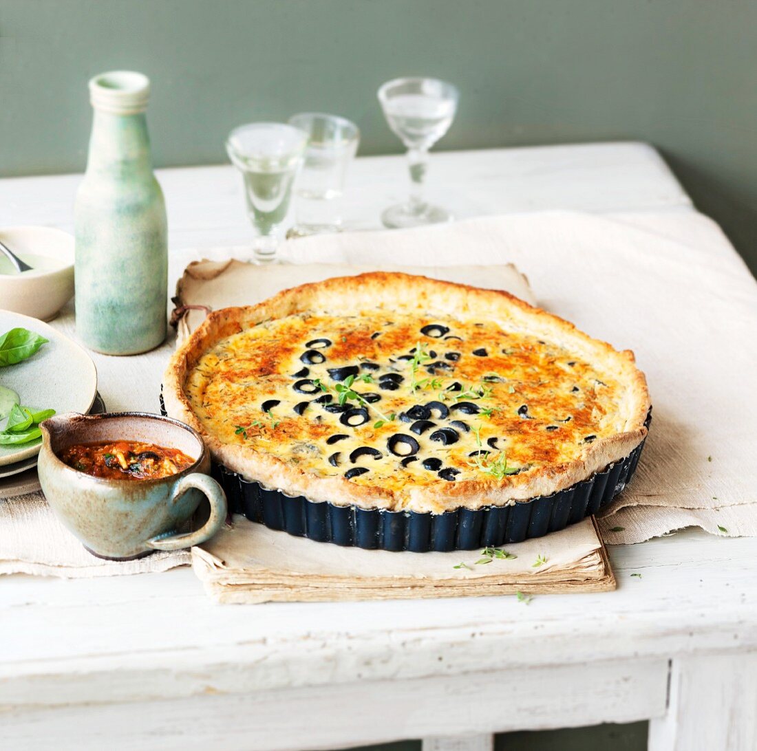 Cheese tart with Parmesan and olives