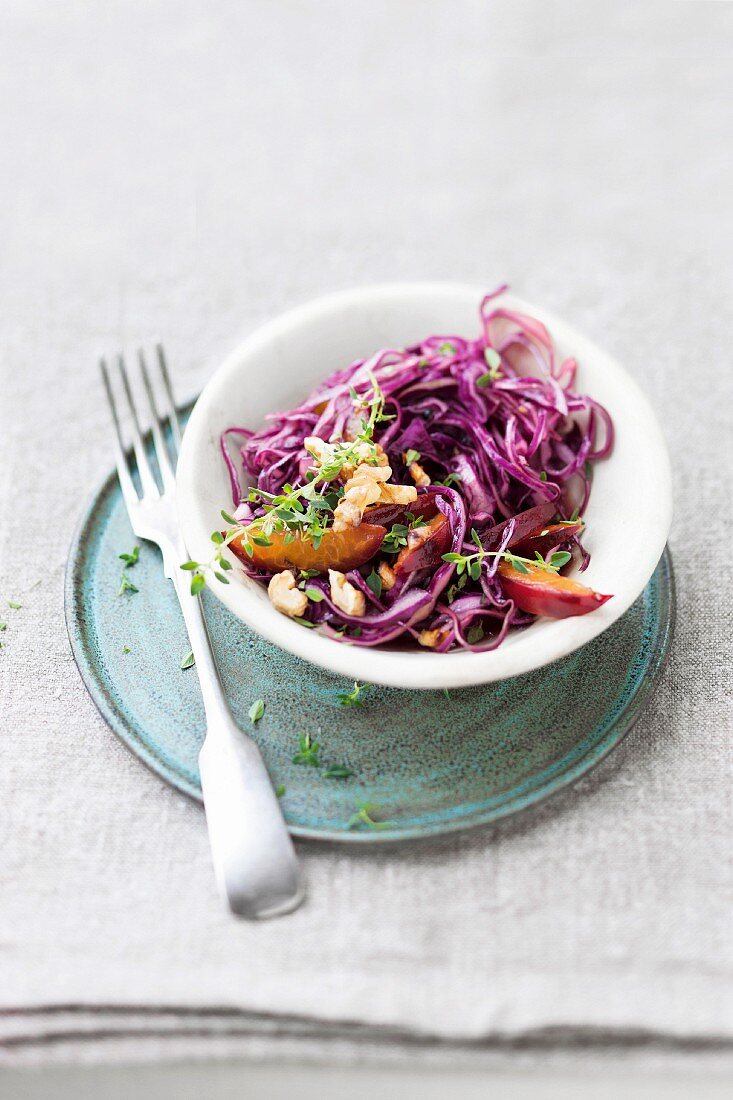 Red cabbage salad with plums and walnuts