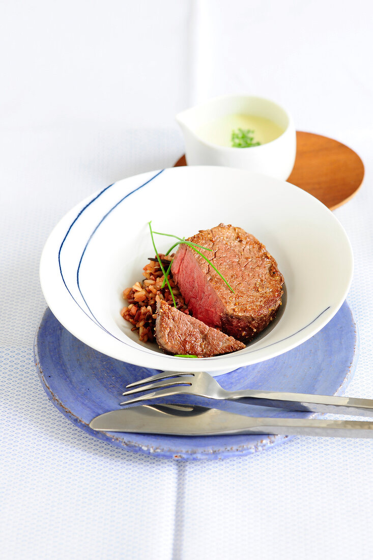 Beef fillet and wasabi cream in bowl