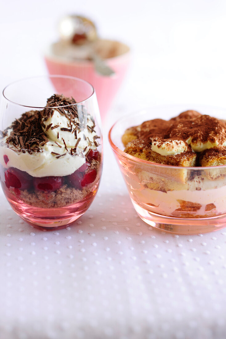 Tiramisu and black forest cake in glasses