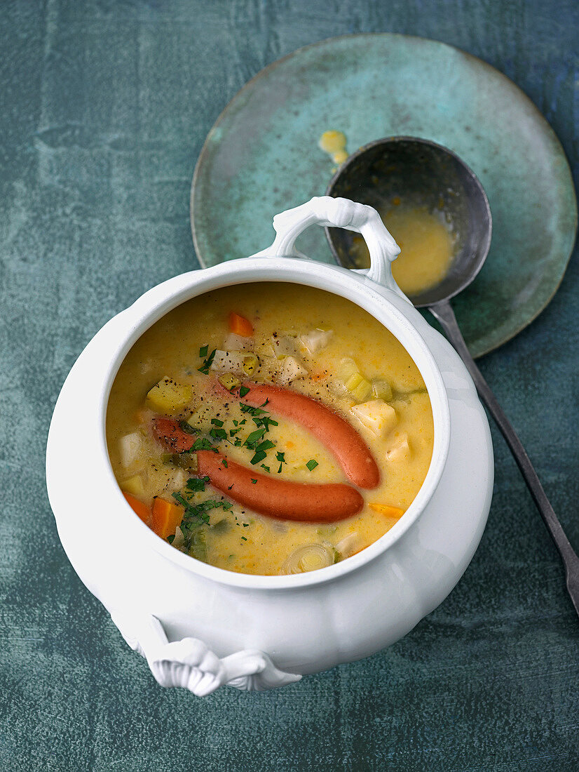 Potato soup with sausages in soup taurean