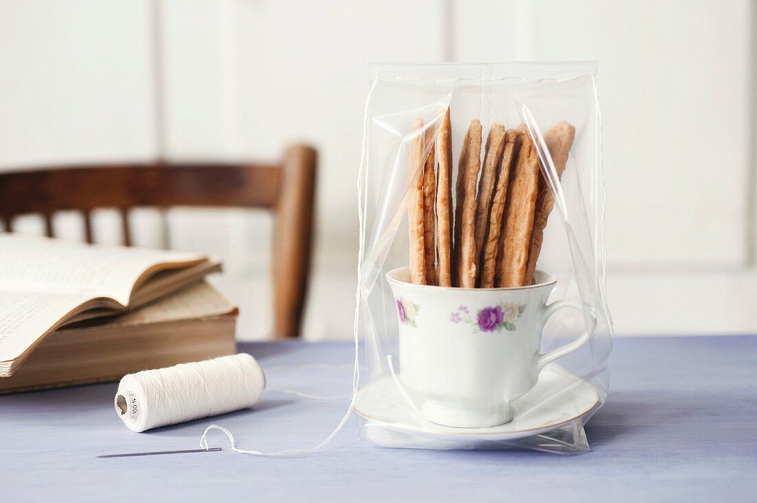 Almond biscuits in a cup as a gift