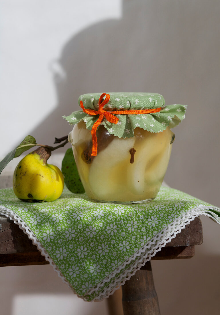 Homemade quince compote in air tight jar