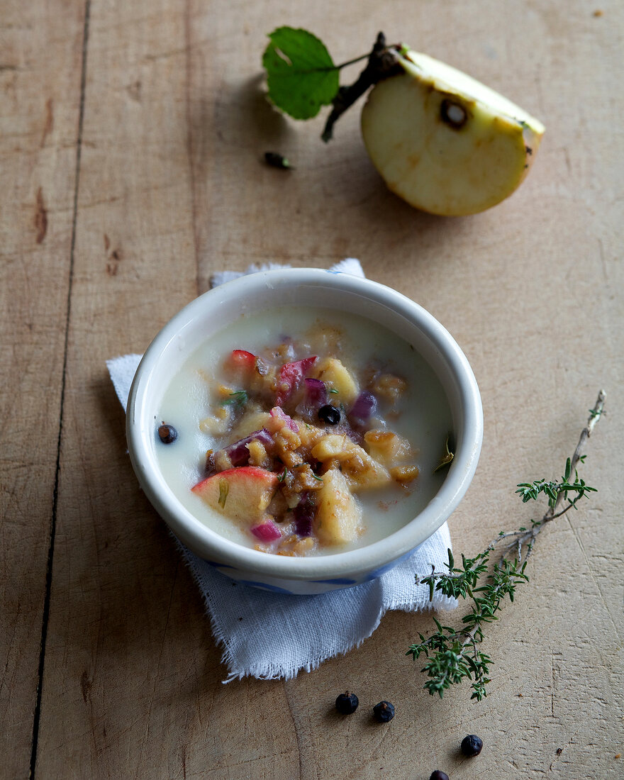 Homemade lard with apples in bowl