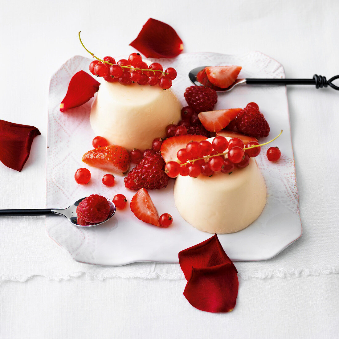 Panna cotta with rose scent and red berries