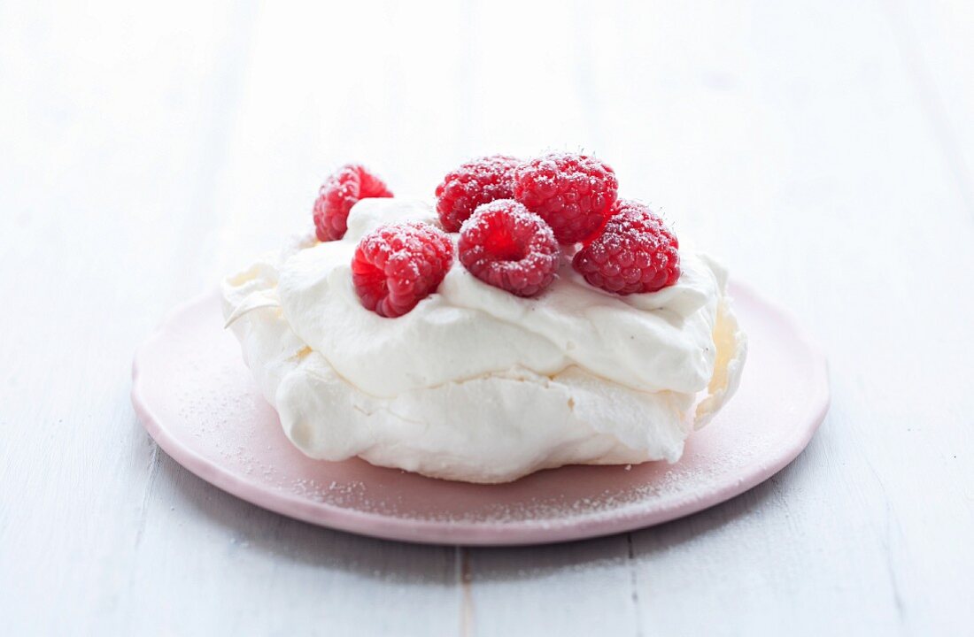 A meringue tartlet with raspberries