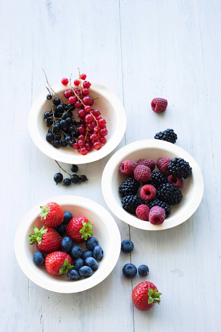 Bowls of various fresh berries