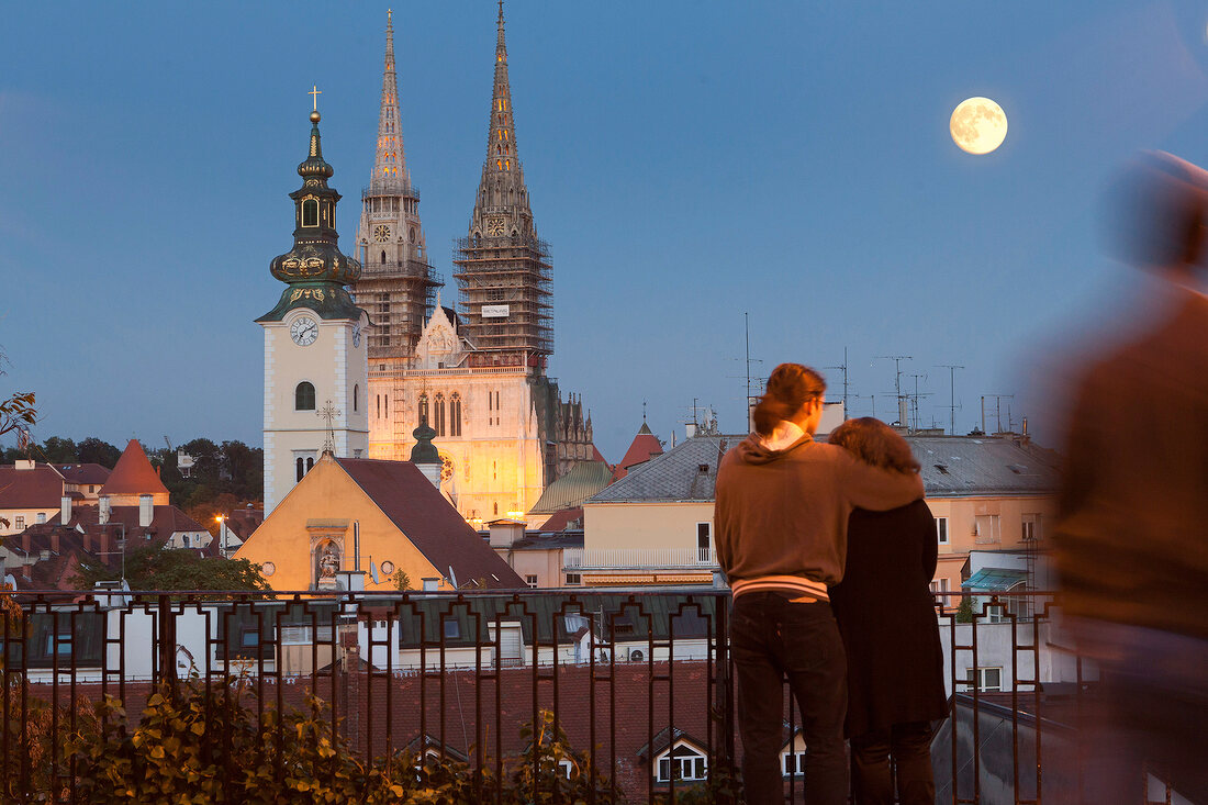 Couple kissing in front of Zagreb Funicular, Croatia