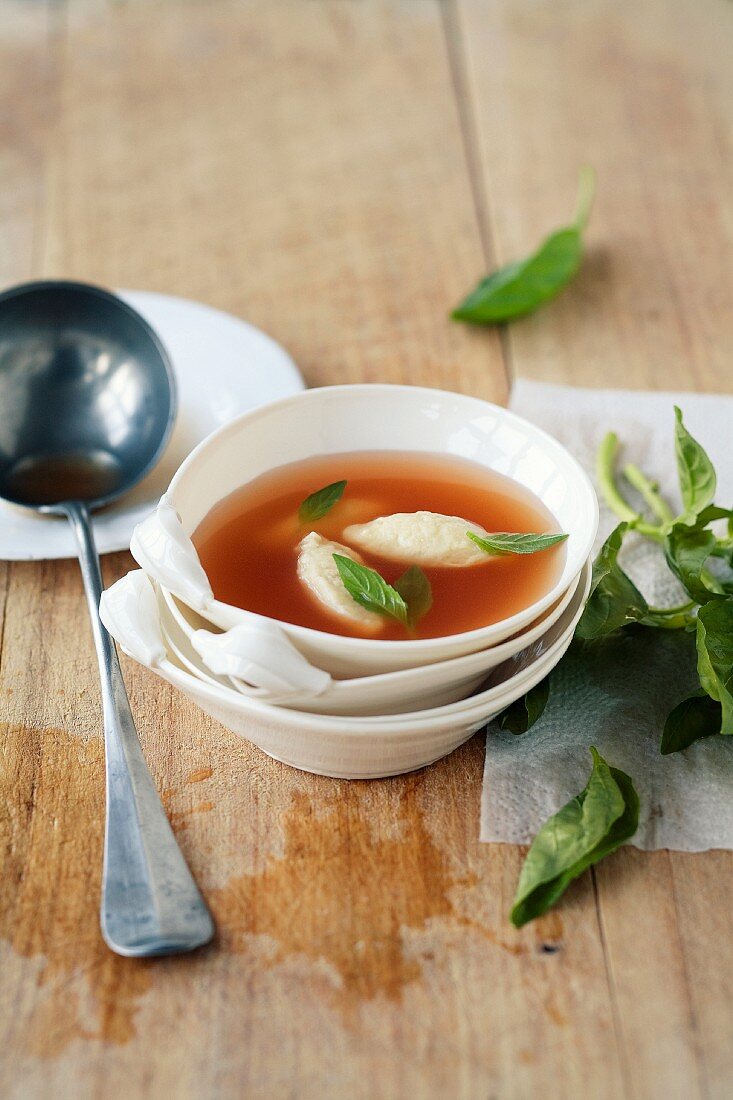 Clear tomato broth with Parmesan dumplings