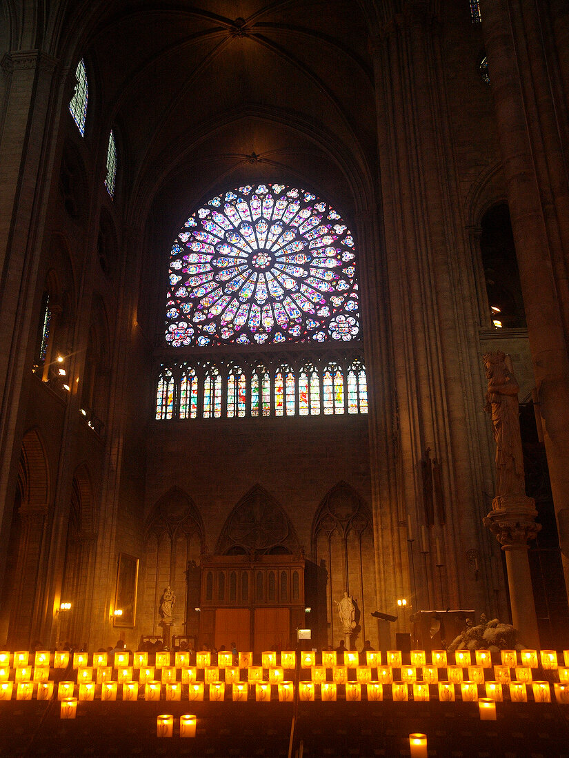 Illuminated interior of Notre Dame Cathedral in Paris, France