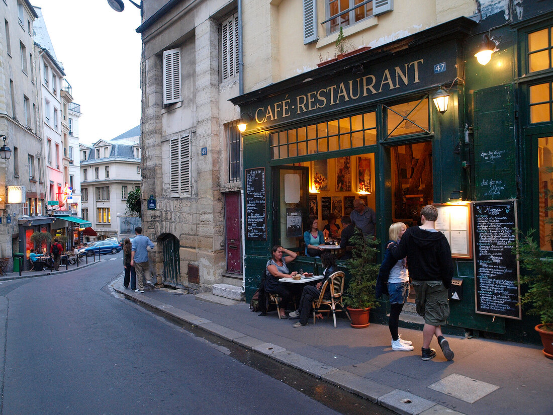 View of people in cafes restaurant in Paris, France