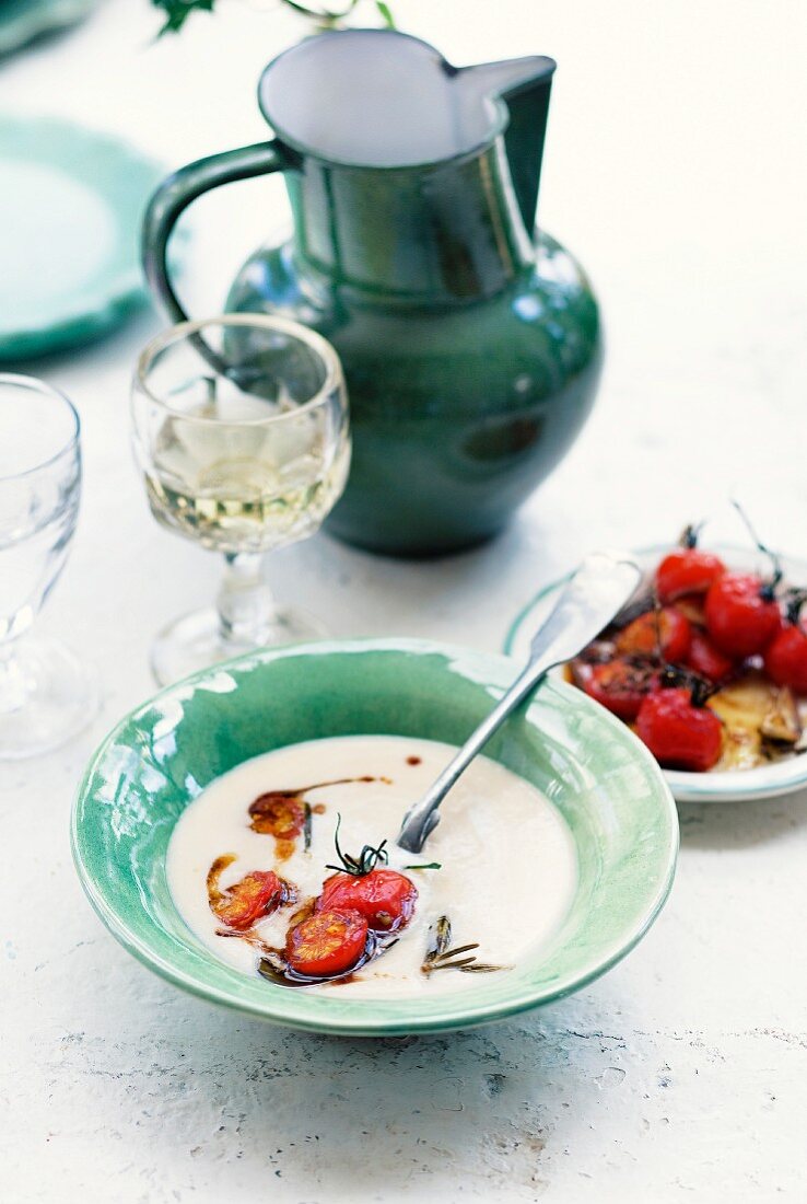 Cream of bean soup with caramelised cherry tomatoes