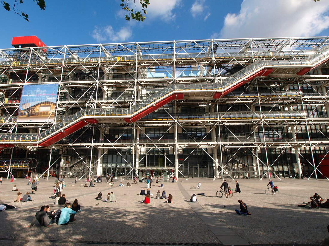 People sitting outside Centre Georges Pompidou Library in Paris, France