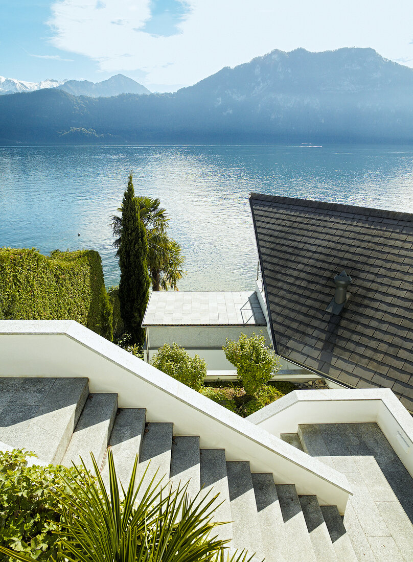 View of Alps, Lake Lucerne and lake house at Weggis, Lucerne, Switzerland