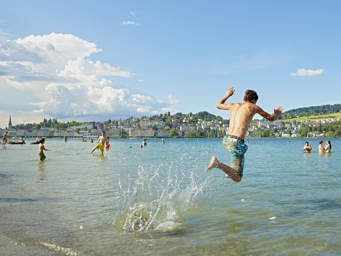 People enjoying and jumping at Ufschotti at Lucerne, Switzerland