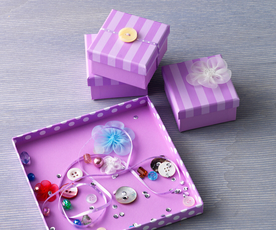 Purple gift box decorated with decorative material